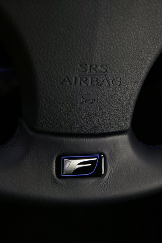 close-up of steering wheel emblem