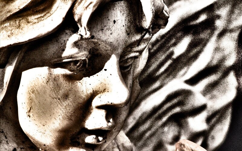 close-up of stone angel sculpture