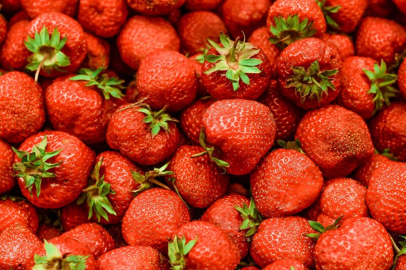Close-up of Strawberries — Red, Fresh, Photograph, Green Tops