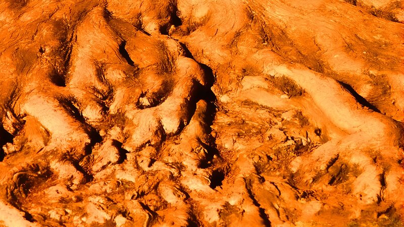 Close-up of textured orange rock