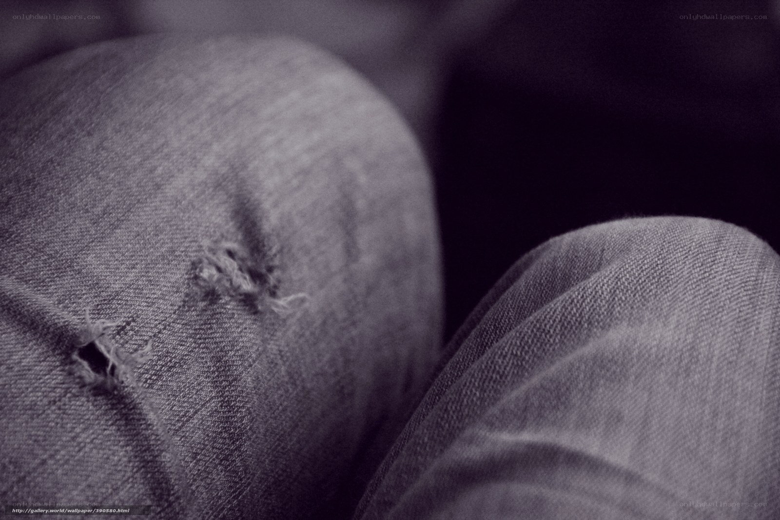 close-up of torn jeans