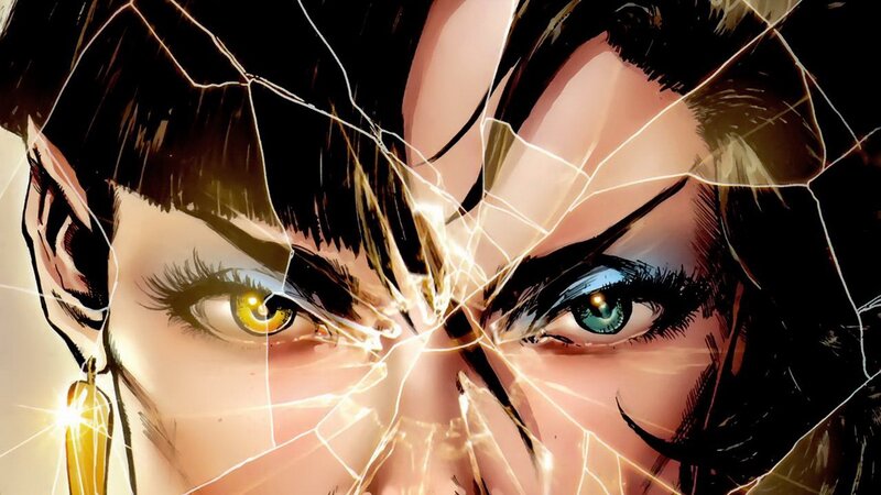 Close-up of two eyes behind shattered glass