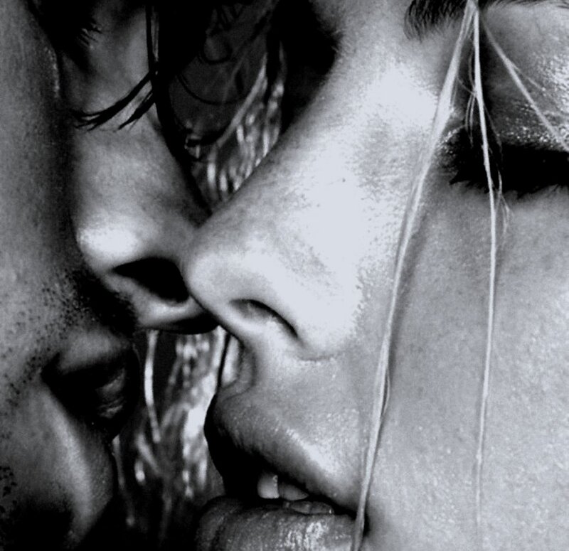 Close-up of Two Faces — Black, Intimate