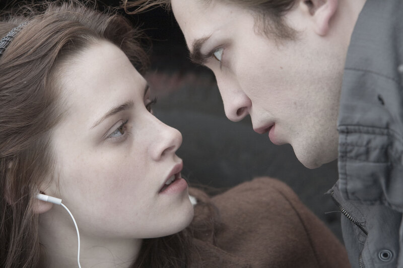 close-up of two people looking at each other