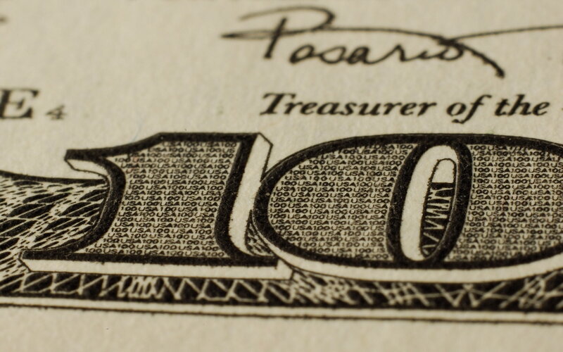 Close-up of US $100 bill