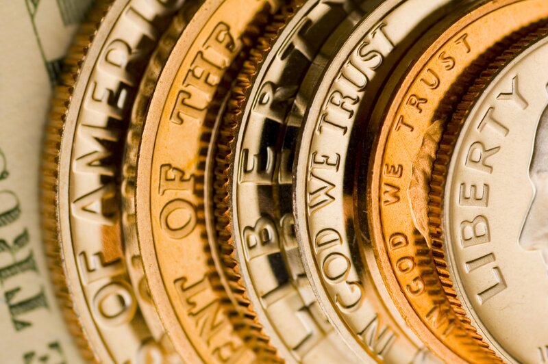 Close-up of US coins and bills
