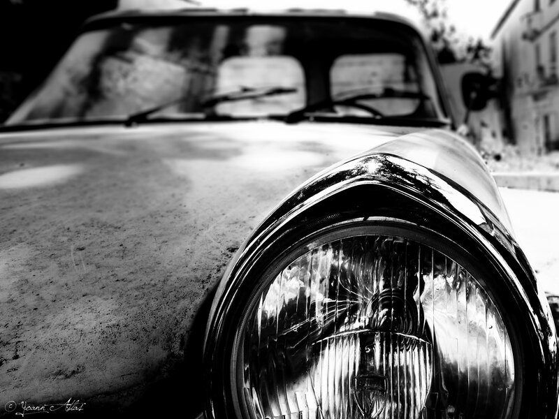 Close-up of vintage car headlight