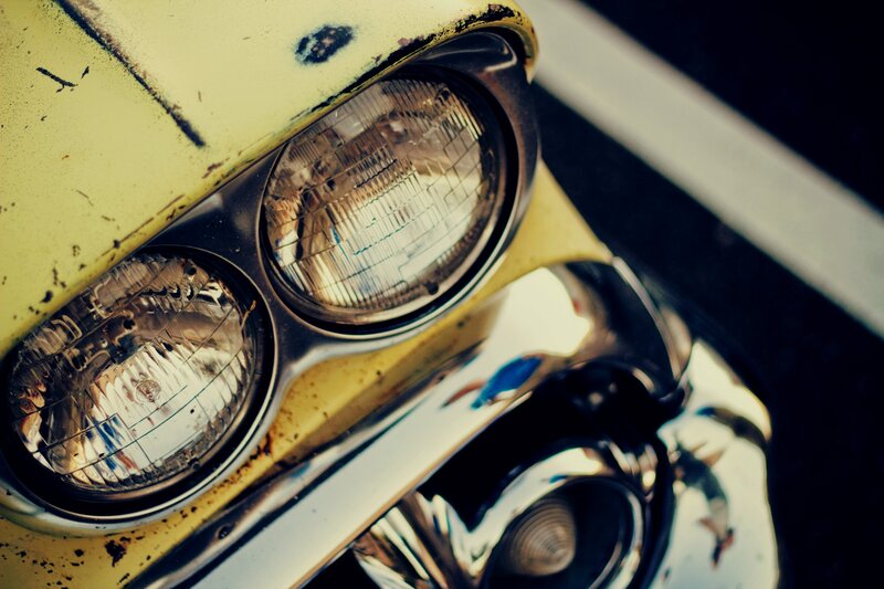 Close-up of vintage car headlights