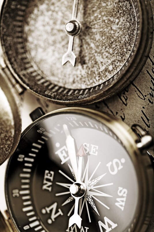 Close-up of vintage compasses