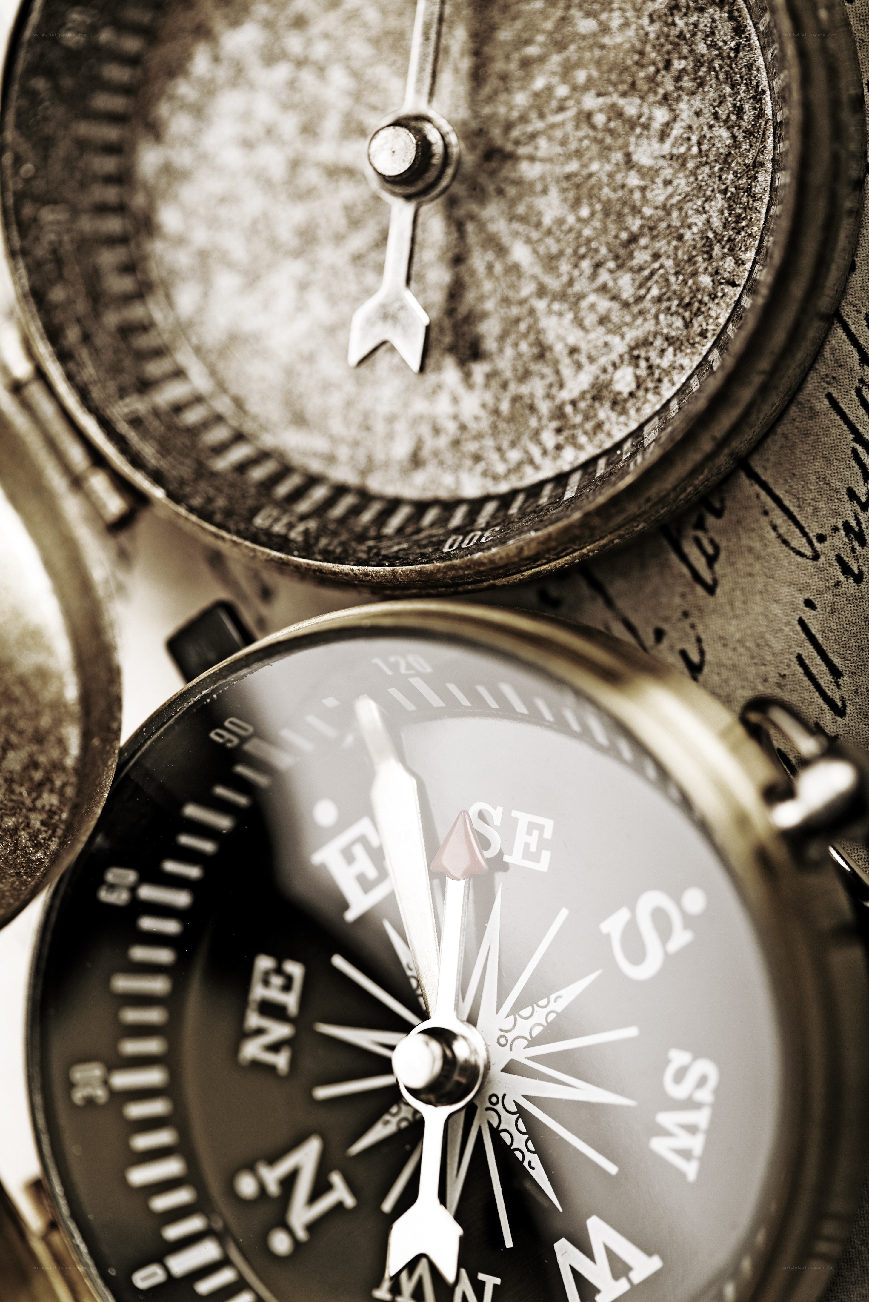 Close-up of vintage compasses