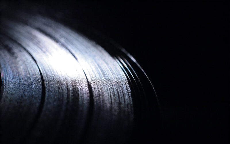 Close-up of Vinyl Record — Black, Dramatic