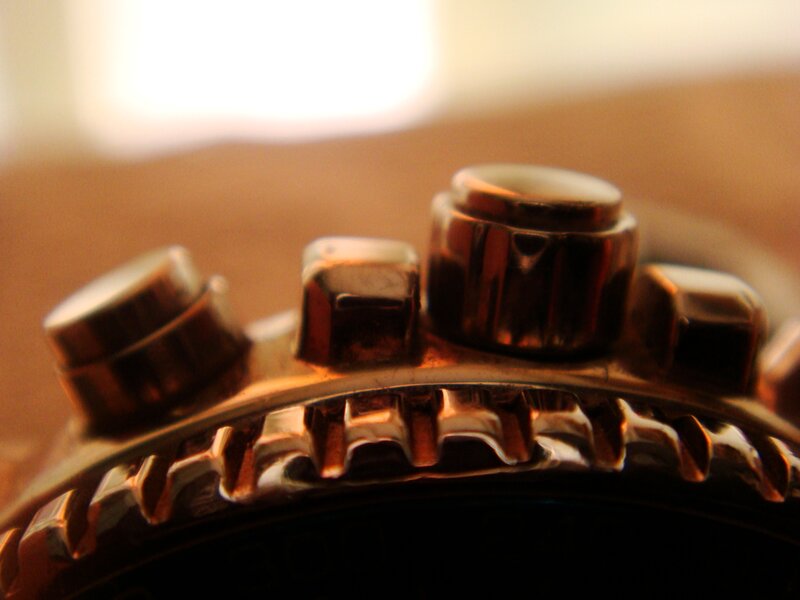 close-up of watch crown and pushers