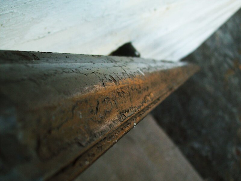 close-up of weathered metal beam
