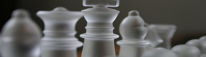 Close-up of white chess pieces