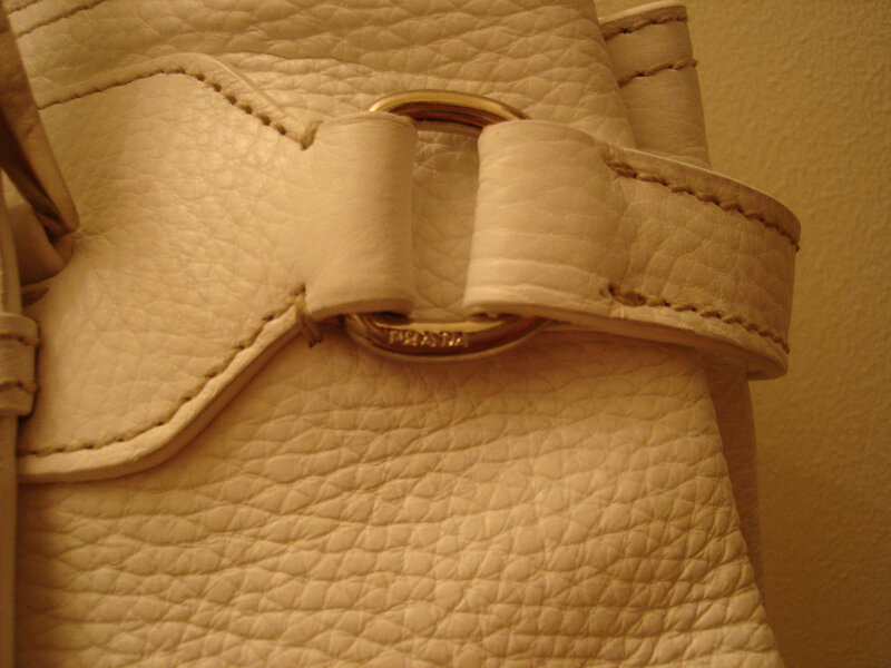 close-up of white leather bag