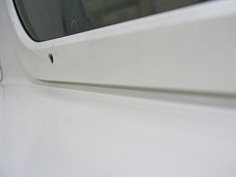 close-up of white vehicle window