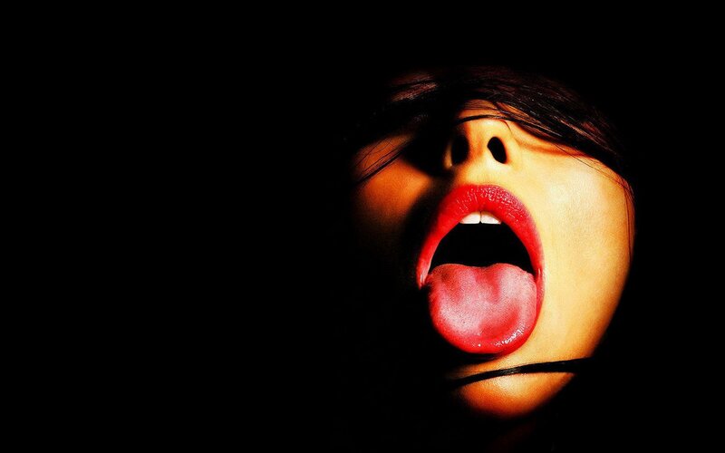 Close-up of Woman's Face — Black, Dramatic, Photograph, Mouth, Tongue