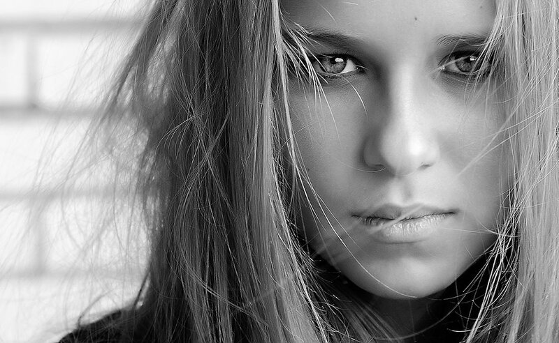 Close-up of Woman's Face — Black, Serious