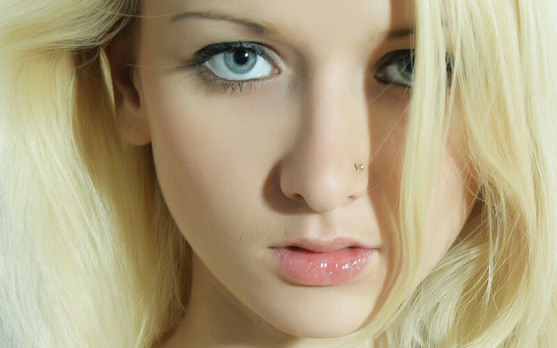 Close-up of Woman's Face — Blonde, Neutral, Photograph, Blonde Hair, Blue Eyes, Nose Ring