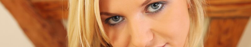Close-up of Woman's Face — Blonde, Neutral, Photograph, Blonde Hair, Blue Eyes, Wooden Background