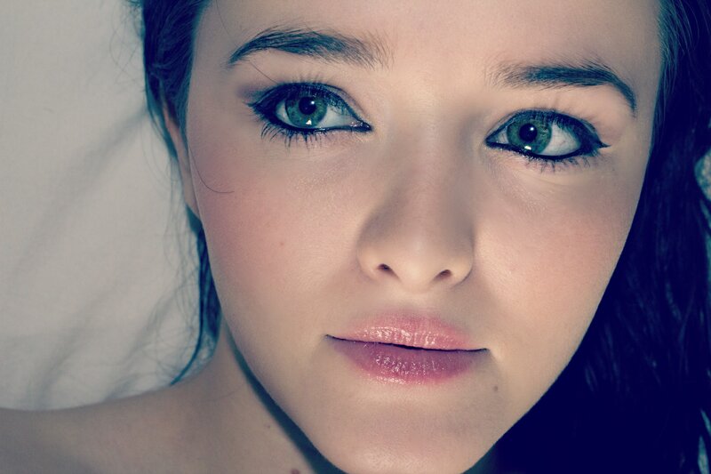 Close-up of Woman's Face — Blue, Calm, Photograph, Eyes, Hair, Pillow