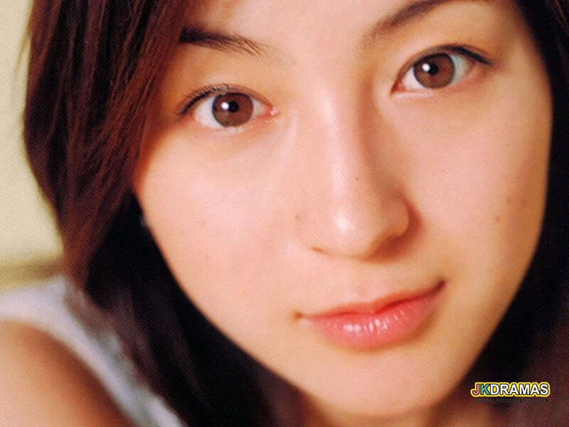 Close-up of Woman's Face — Brown, Calm, Photograph, Brown Eyes