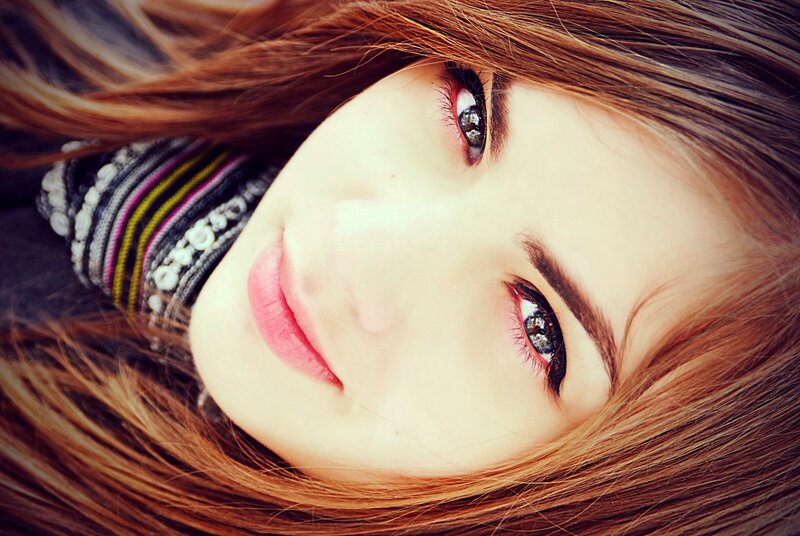 Close-up of Woman's Face — Brown, Calm, Photograph, Hair, Eyes, Scarf