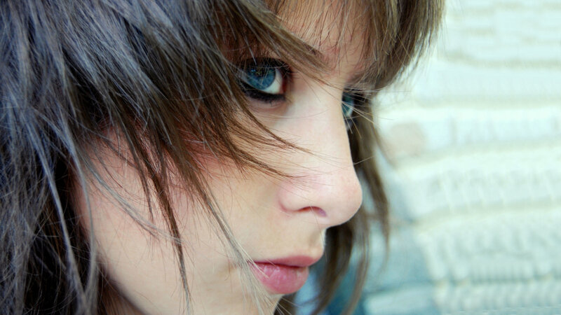 Close-up of Woman's Face — Brown, Contemplative