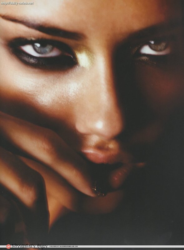 Close-up of Woman's Face — Brown, Dramatic, Photograph, Eyes, Makeup, Hand