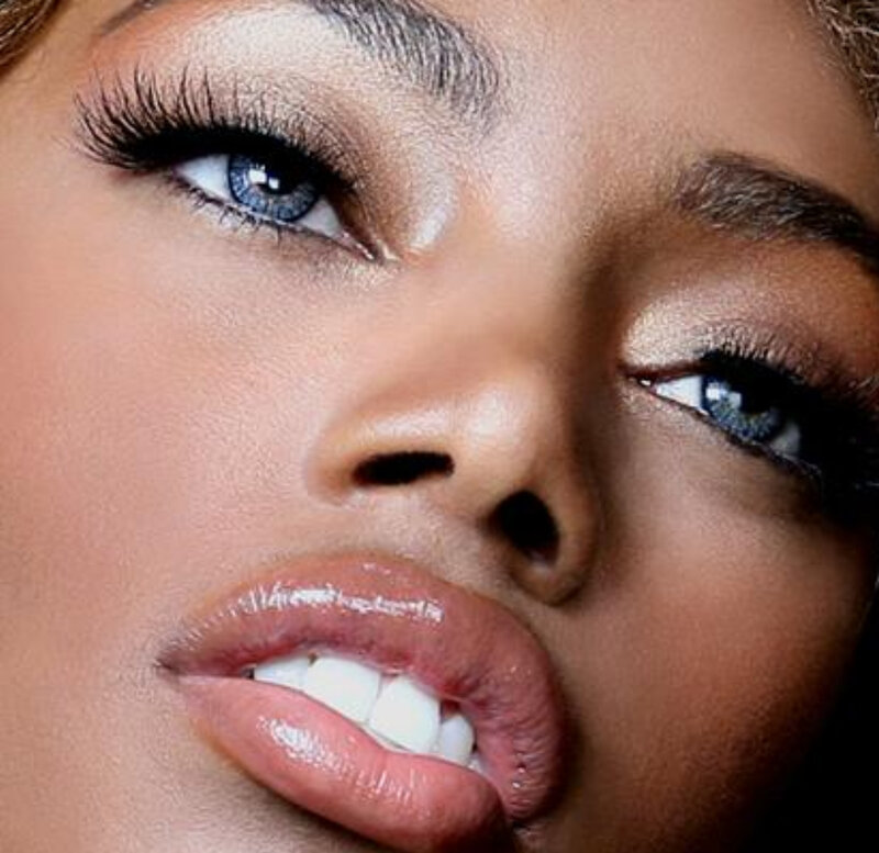 Close-up of Woman's Face — Brown, Dramatic, Photograph