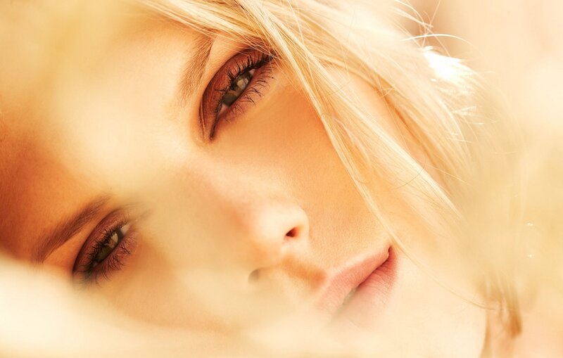Close-up of Woman's Face — Gold, Serene