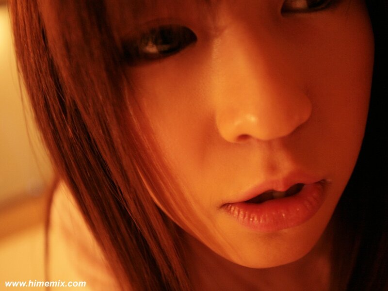 Close-up of Woman's Face — Orange, Intense, Photograph