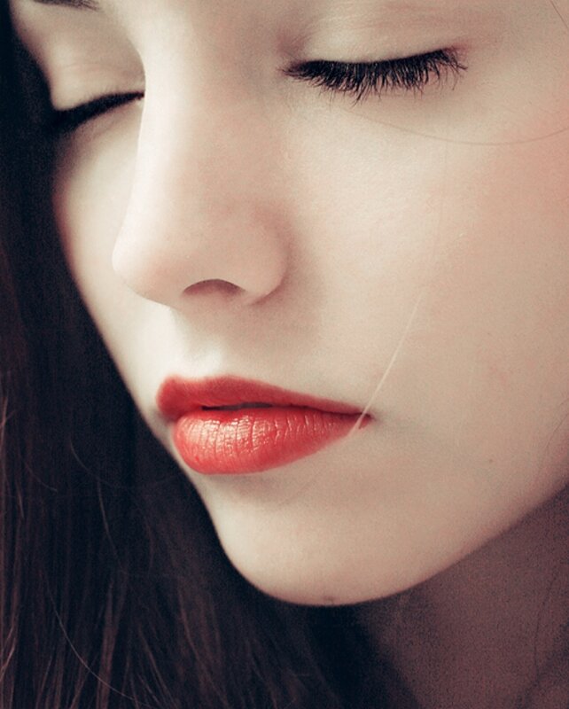 Close-up of Woman's Face — Red, Serene