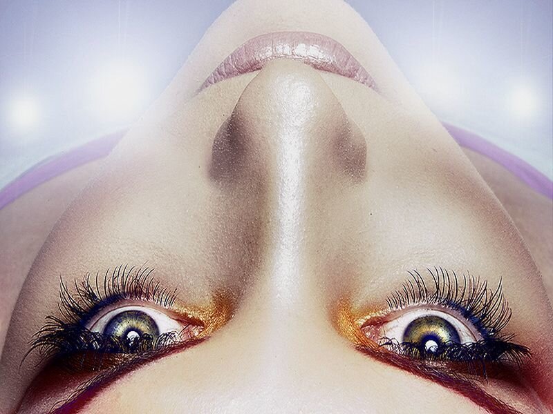 Close-up of Woman's Face — White, Dramatic, Photograph