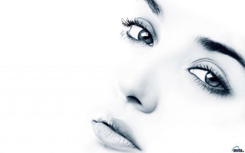 Close-up of Woman's Face — White, Dramatic
