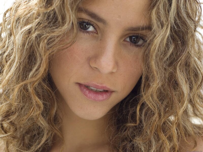 close-up of woman with curly hair