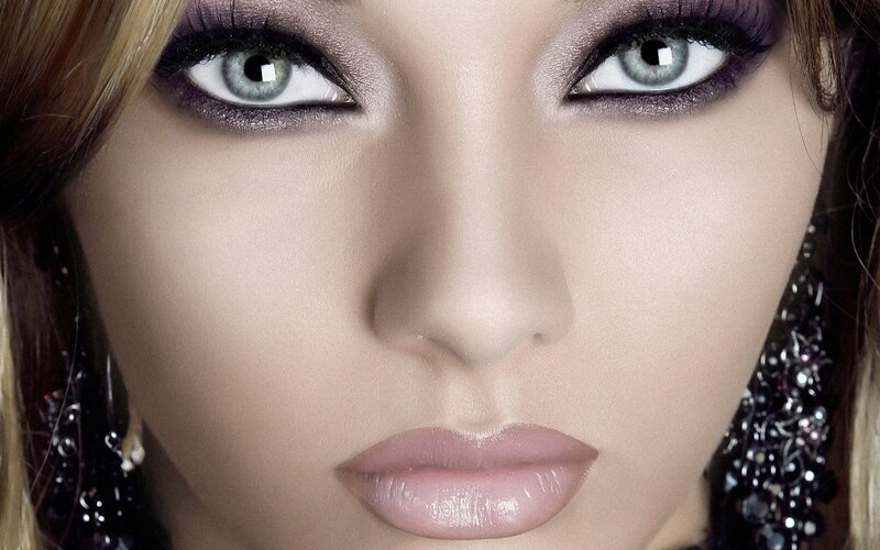 close-up of woman with dramatic makeup