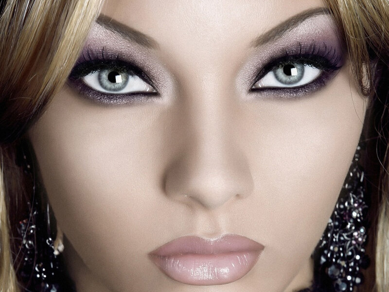 close-up of woman with dramatic makeup