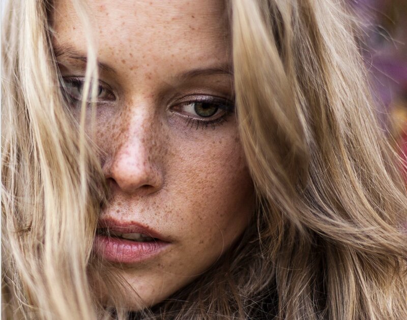 close-up of woman with freckles