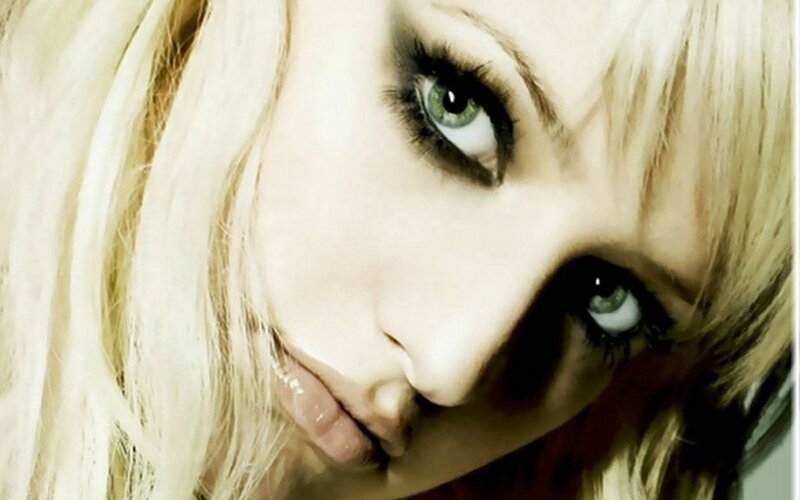 close-up of woman with green eyes