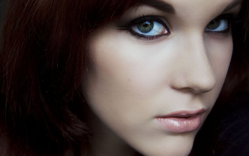 close-up of woman with green eyes