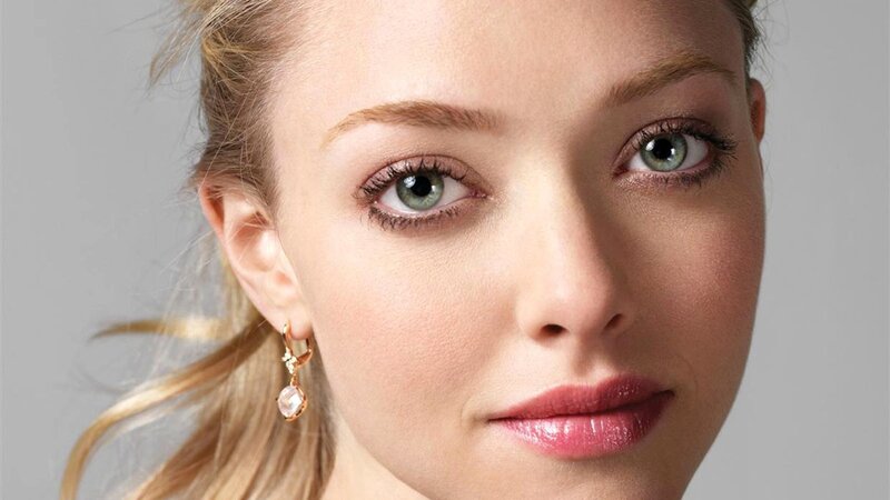 close-up of woman with green eyes