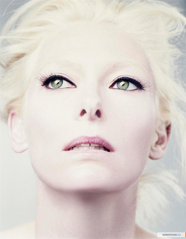 close-up of woman with green eyes