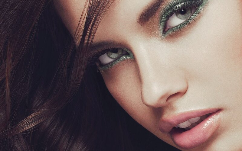 close-up of woman with green eyeshadow