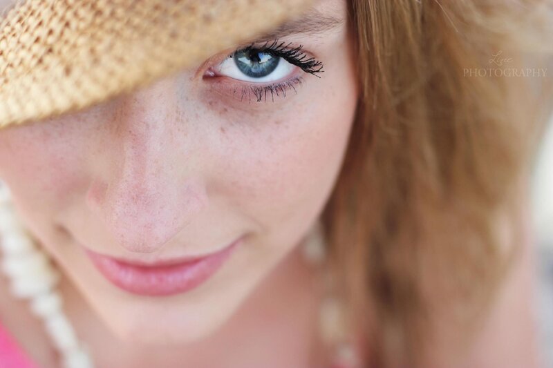 close-up of woman with hat