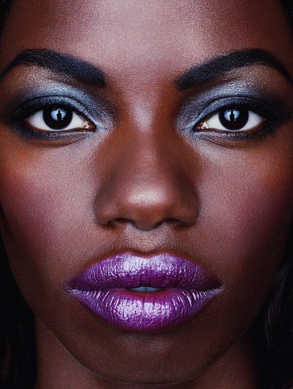 close-up of woman with purple lipstick