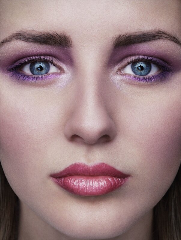 close-up of woman with purple makeup