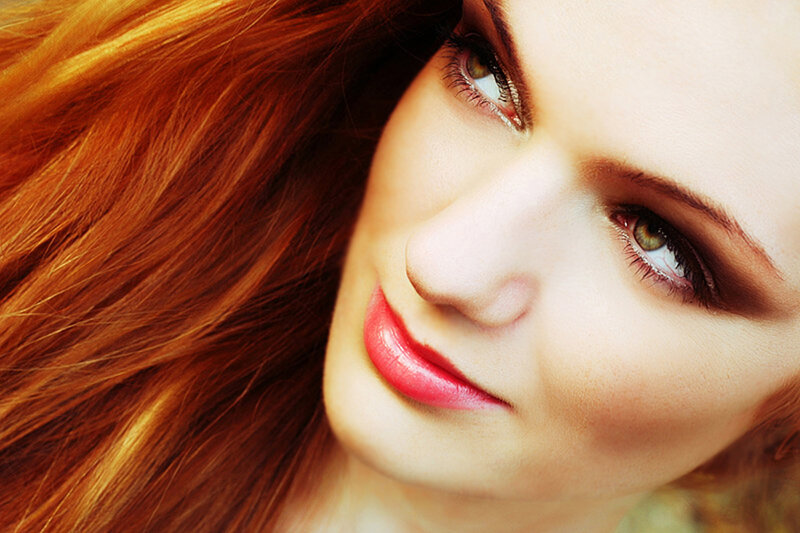 close-up of woman with red hair