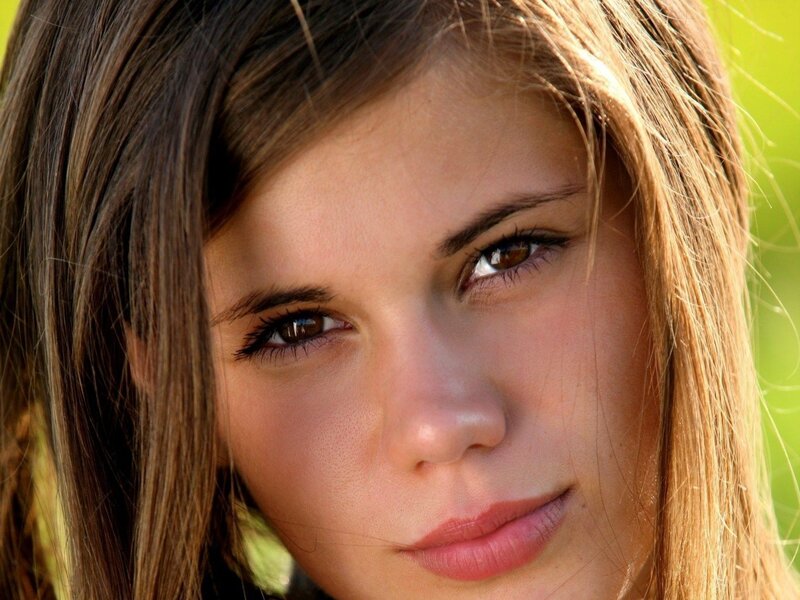 Close-up of Young Woman — Brown, Calm, Afternoon