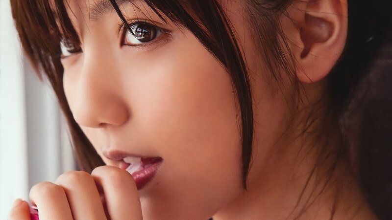Close-up of Young Woman — Brown, Contemplative